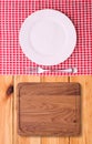 Cutlery red checkered tablecloth tartan on wooden Royalty Free Stock Photo