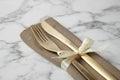 Cutlery set for festive table on marble background Royalty Free Stock Photo