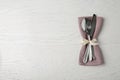 Cutlery set for festive table on white wooden background. Space for text Royalty Free Stock Photo