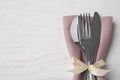 Cutlery set for festive table on wooden background. Space for text Royalty Free Stock Photo