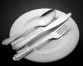 Cutlery set fork knife and spoon isolated on white plate Kitchen Utensils Royalty Free Stock Photo