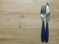 Cutlery set:fork,spoon and knife on rustic wooden table Royalty Free Stock Photo