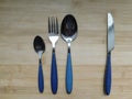 Cutlery set:fork,spoon and knife on rustic wooden table Royalty Free Stock Photo