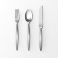 Cutlery Set of Silver Fork Spoon and Knife Top View Isolated on White Background. Table Setting