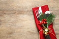 Cutlery set on wooden table, top view. Christmas celebration Royalty Free Stock Photo