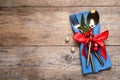 Cutlery set on wooden table, top view. Christmas celebration Royalty Free Stock Photo