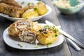 Cutlet cordon bleu and hasselback potatoes