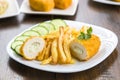 Cutlet de volaille with fries Royalty Free Stock Photo