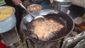 The cutlet making is in progress in a fast-food kitchen