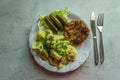 Cutlet with potatoes as the main dinner dish. Royalty Free Stock Photo