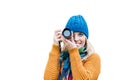 Portrait of beautiful woman photographing lovely maple trees in park