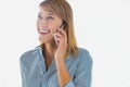 Cutout of Smiling businesswoman talking on smartphone