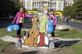 Cutout Scooby-Doo with two girls