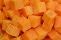 Cuts cubes of carrot. detail Royalty Free Stock Photo