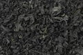 Cuts of dried wakame seaweed close up full frame Royalty Free Stock Photo