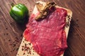 Cuts of raw steak premium on rustic wooden table. Fresh and raw meat. Raw meat mixture. Raw beef steaks on wooden table