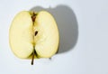 Cutted apple  on white background. Raw half an apple Royalty Free Stock Photo