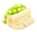 Cutted banana with grape isolated on a white background.