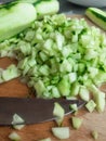 Cutted cucumbers on board for salad fresh recipy Royalty Free Stock Photo