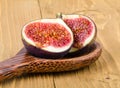 Cutted figs on wood spoon
