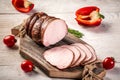 Cutted Ham Sausage on wooden background. cold meats Royalty Free Stock Photo