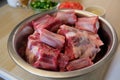Cutted oxtail in a bowl. Raw meat Royalty Free Stock Photo