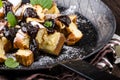 Cutted pancakes, Kaiserschmarrn delish dessert with plums Royalty Free Stock Photo