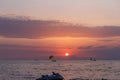 Cutter Boat with Sunset over the Sea Royalty Free Stock Photo