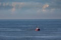 A cutter with lifted drag nets on the North sea Royalty Free Stock Photo