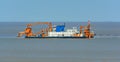 Cutter suction dredger at work