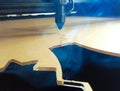 cutting acrylic plastic materials with a laser machine.