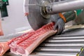 Cutting beef at a meat factory