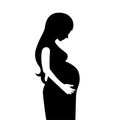 Cutting black silhouette of pregnant woman with large belly Royalty Free Stock Photo