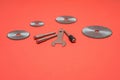 Cutting blades for professional engraving machine isolated on red color. Dremel attachments Royalty Free Stock Photo