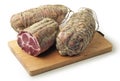 Cutting board with air-cured pork meat coppa Royalty Free Stock Photo