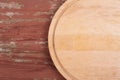 Cutting board for cutting bread, pizza or steak on a wooden background Royalty Free Stock Photo