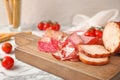 Cutting board with different meat delicacies Royalty Free Stock Photo