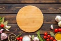 Cutting board in frame of food for chef work on wooden background top view space for text Royalty Free Stock Photo