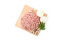 Cutting board with minced meat and spices isolated on background Royalty Free Stock Photo