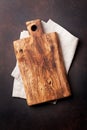 Cutting board over towel on stone kitchen table Royalty Free Stock Photo