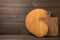 Cutting board over towel on wooden kitchen table. Royalty Free Stock Photo