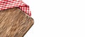 Cutting board and red checkered napkin on white background Royalty Free Stock Photo