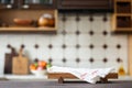 Cutting board on table over blurred home kitchen Royalty Free Stock Photo
