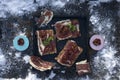 A cutting board  with  Traditional  tapas    with  spanish cured meat, sun dried tomato,  parsley on background Royalty Free Stock Photo