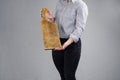 Cutting board. Young woman hold a large kitchen board in her hands. Royalty Free Stock Photo