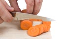 Cutting carrots on the board Royalty Free Stock Photo