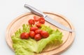 cutting cherry tomatoes Royalty Free Stock Photo