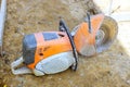 For cutting concrete, this petrol saw is equipped with a diamond blade, ready to use Royalty Free Stock Photo