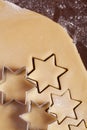 Cutting cookies dough star shape