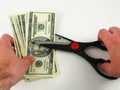 Cutting Costs - Scissors and Dollars